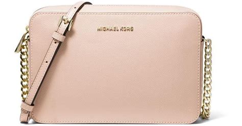 michael kors light pink messenger bag|michael kors studded crossbody bag.